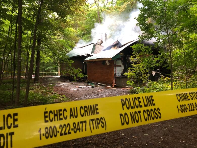 The remains of a sugar shack after a fire.