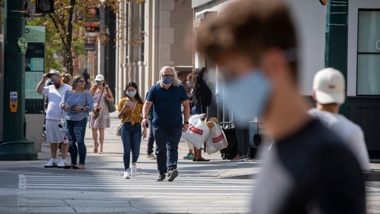 People wearing masks during the second wave of the COVID-19 pandemic.