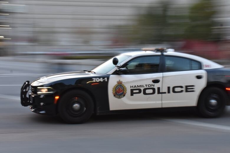 A police car in motion.