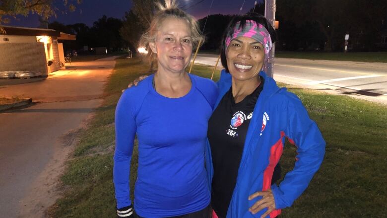 Two women in running attire