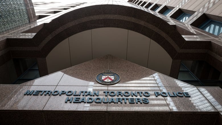 A photo of the Toronto police headquarter sign.