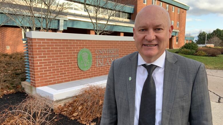 Greg Keefe in front of Atlantic Veterinary College at UPEI.