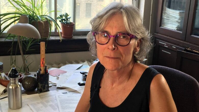 Valerie Tarasuk sitting at a desk.