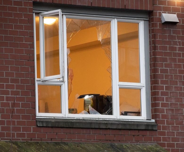 A broken window was visible at Grace Mansion after a police incident in Vancouver on Jan. 5, 2020.