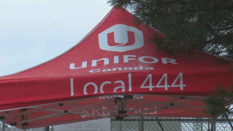 A gazebo displaying Local 444's logo