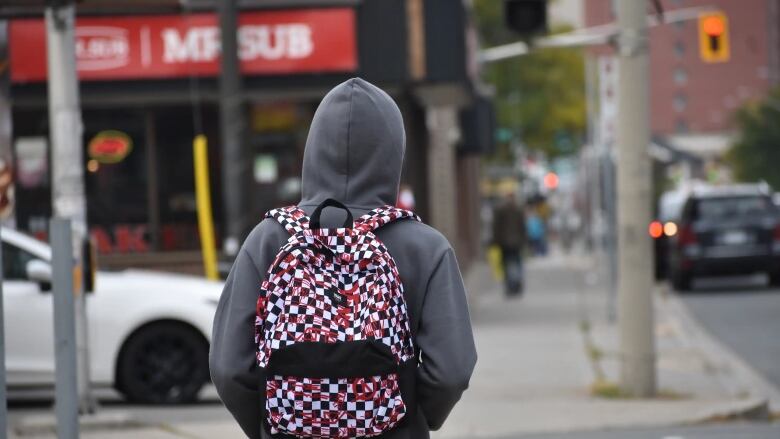 A person wearing a backpack.