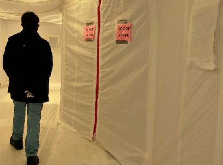 The ceiling, walls and floor have been covered and taped off inside Calgary's 'isolation hotel.' The hotel is closed to the public and is being used to house international travellers completing a 14 day mandatory quarantine.