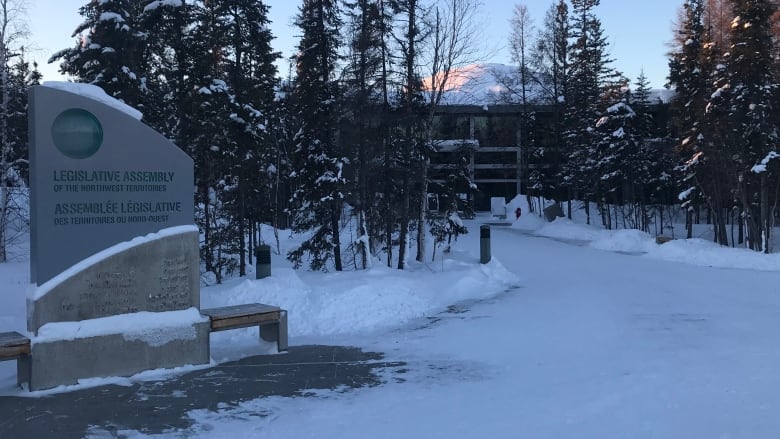 Image of the front of the Northwest Territories Legislative Assembly in the snow