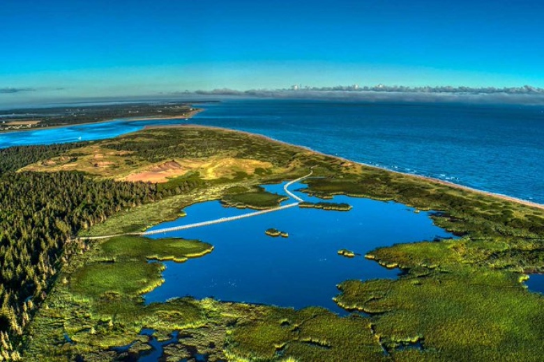 A Parks Canada image of its park property at Greenwich on the North Shore of P.E.I. The line showing in the middle of the inland body of water is the park's well-known boardwalk. 