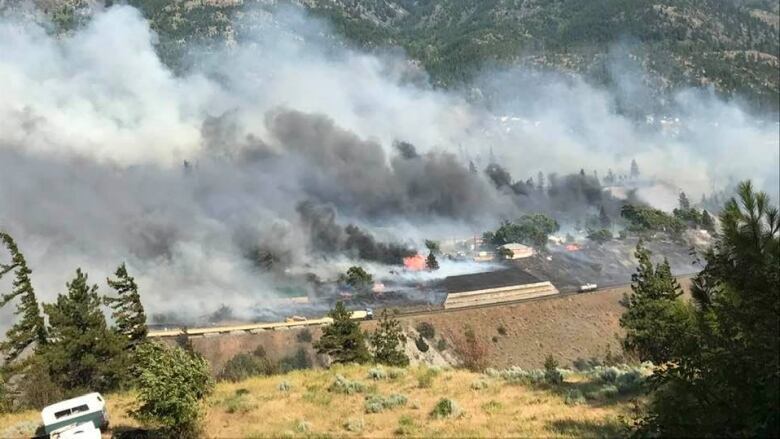 smoke rises from the ground in Lytton