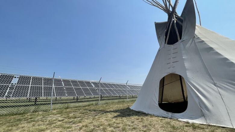 Solar panels stand in front of the Cowessess Community Education Center. Energy used from the panels will offset the school's consumption. These panels are also located at four other community buildings: the water treament plant, the mall, the band office and the senior's centre.