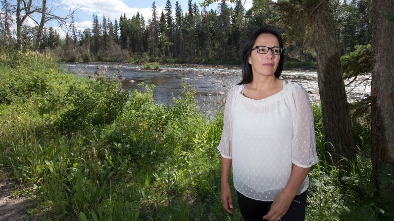 Chief Tammy Cook-Searson of the Lac La Ronge poses for a photo near a Montreal river between La Ronge and Air Ronge on Friday, July 24, 2015.