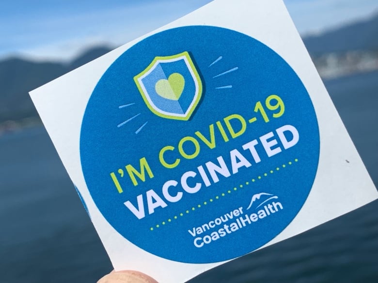 A sticker reading 'I'm COVID-19 Vaccinated' with a symbol of Vancouver Coastal Health below it.