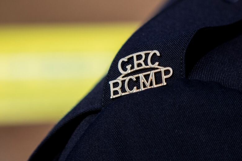 A shoulder patch that reads 'GRC RCMP'.