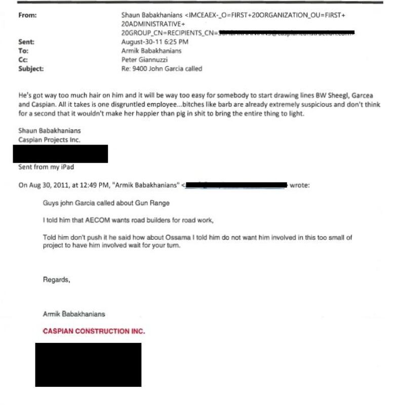 A photo shows an email, with some text blacked out.