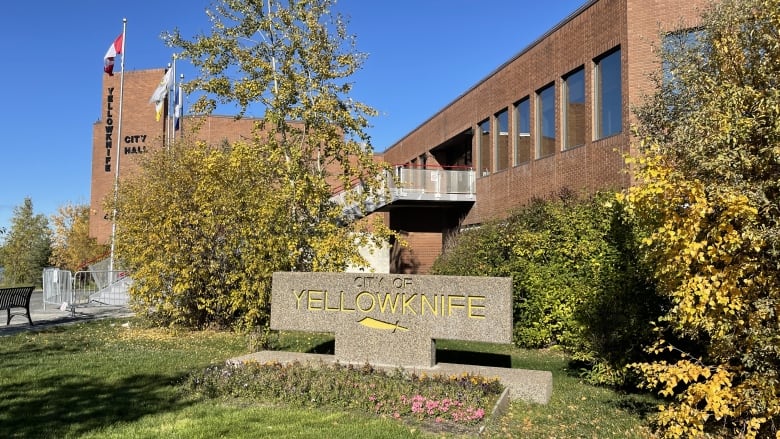 Building with sign that says city of yellowknife.