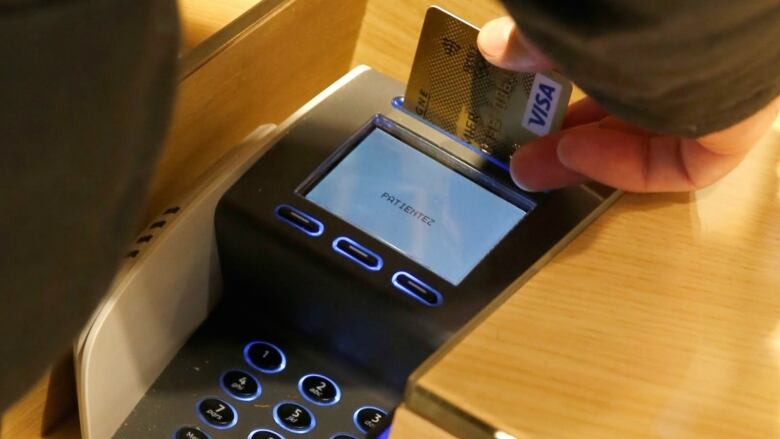 a credit card payment terminal is shown