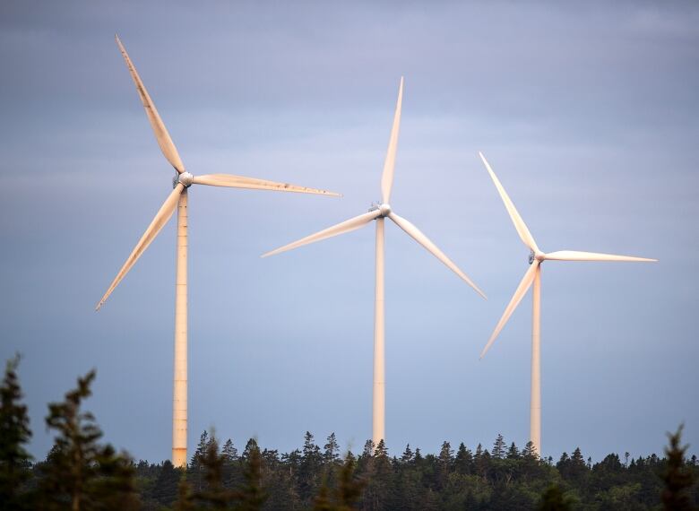 Three wind turbines.