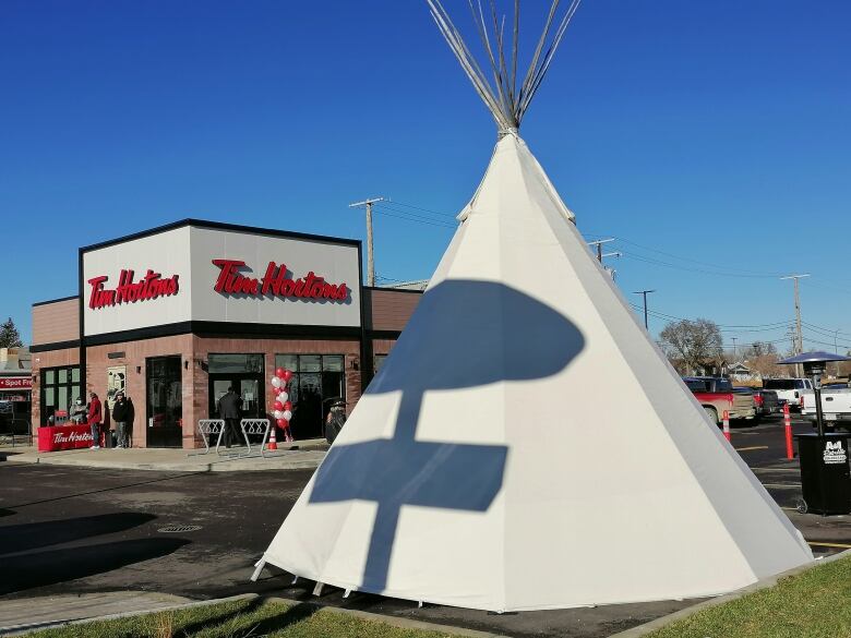 A teepee was raised at the grand opening of a Tim Hortons in Regina