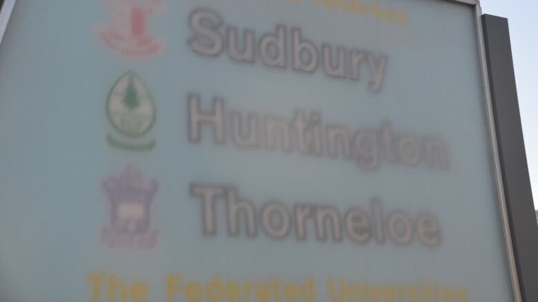 A faded sign reads Sudbury, Huntington and Thorneloe