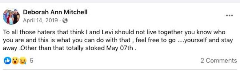 A facebook post with text that reads: To all those haters that think I and Levi should not live together, you know who you are and this is what you can do with that, feel free to go  yourself and stay away. Other than that, totally stoked May 07th.