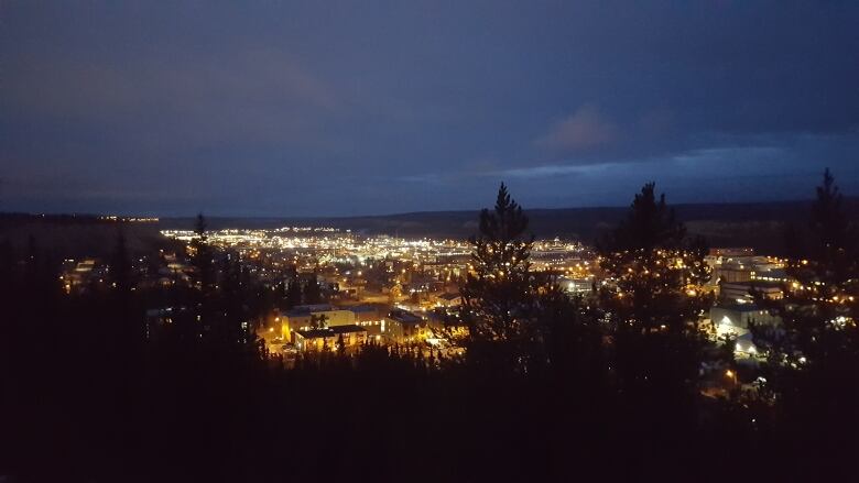 Overlooking a small city at night.