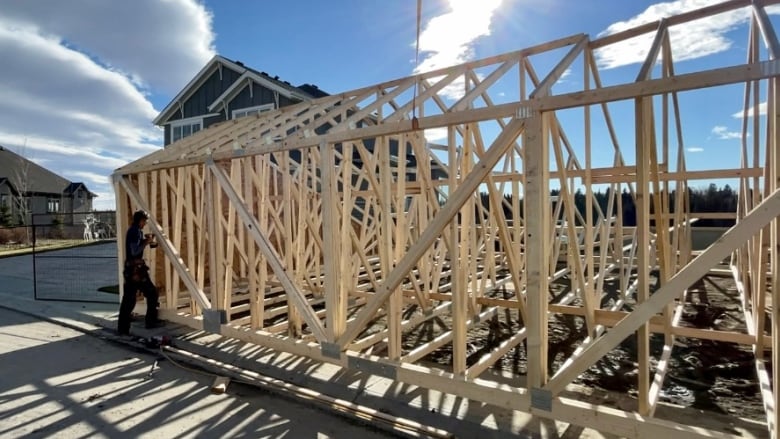 The frame of a house being built.