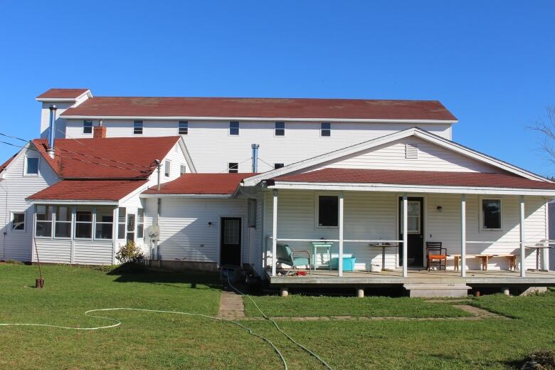 Large white building with red roof