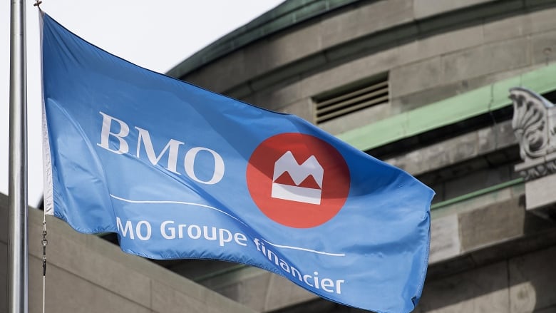 A flag waves with the BMO logo on it.