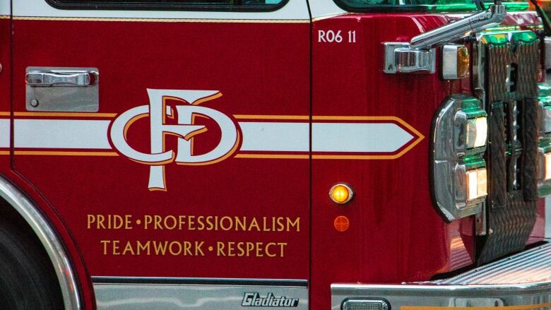 the side of a calgary fire department firetruck.