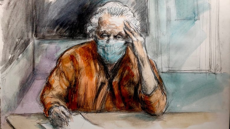 This is a sketch of Peter Nygard who appeared via video from the Toronto South Detention Centre. He is wearing a orange prison jumpsuit and has on a blue non-surgical mask. Nygard is resting his head on his hand.