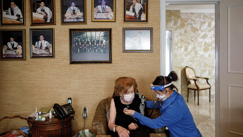 An animation gif shows physicians Eugenie Phan and Christa Sinclair-Mills as well as occupational therapist Leslie Coulter, visiting patients of House Calls in Toronto on Jan. 21, 2022. 