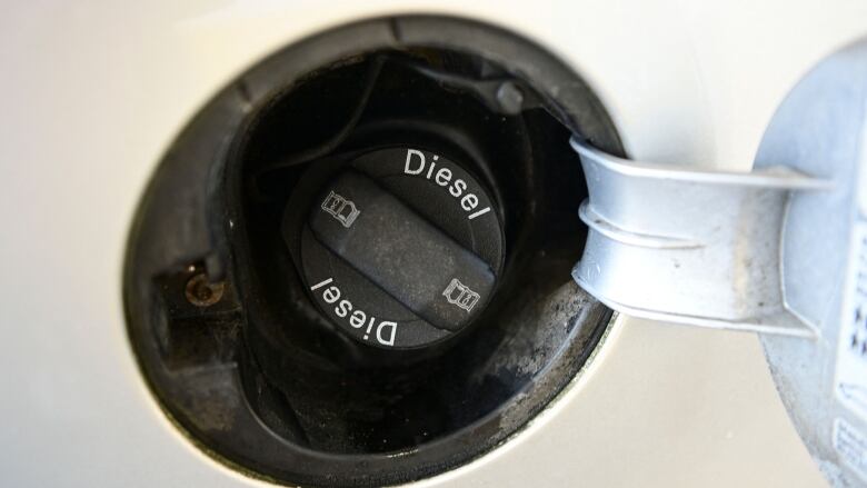 A diesel cap of a vehicle.