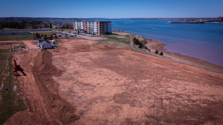 The Stratford waterfront with dirt where the sewage lagoons used to be 