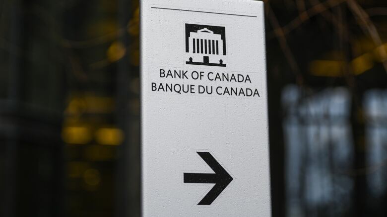 A sign is posted on the door of the Bank of Canada building in Ottawa.