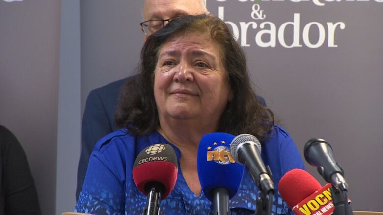 Tina Davies speaks to reporters during a news conference on June 1, 2022.