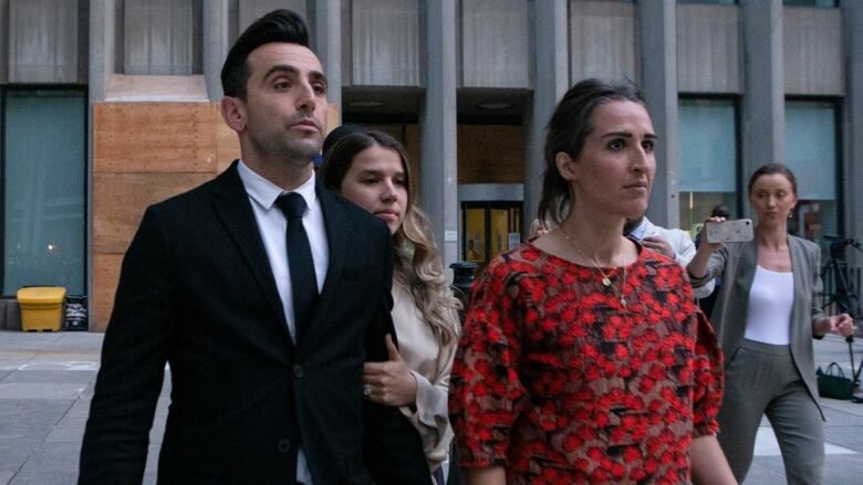 Jacob Hoggard leaves court after being found guilty of one count of sexual assault, in Toronto, Sunday, June 5, 2022.