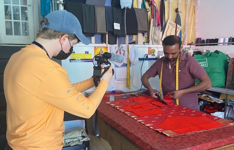 CBC Reporter Fenn Mayes records Vasanth Rajaratnam as he created custom bodis.