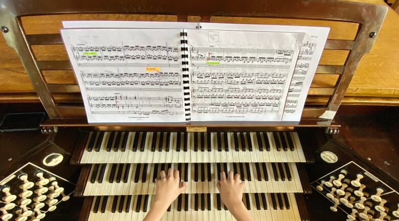 Organ keyboard and sheet music