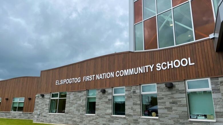 The front of Elsipogtog First Nation Community School. A sign says Elsipogtog First Nation Community School.