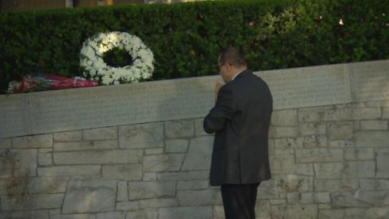 A man remembers victims of the 1985 Air India bombing, during a 37th anniversary memorial vigil in Vancouver's Stanley Park on Thursday, June 23, 2022.