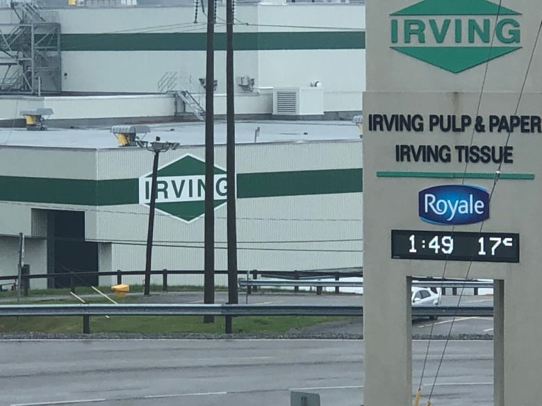 pulp mill with a sign that reads: Irving Pulp and Paper 