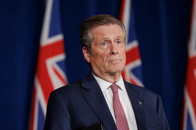 Mayor John Tory and premier Doug Ford speak at a press conference after a closed-door meeting at Queens Park, in Toronto, on Jun. 27, 2022.