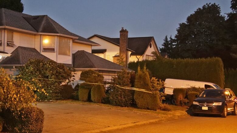 Police tape marks the home where Kamaljit Sandhu, 45, was found dying on July 28, 2022.