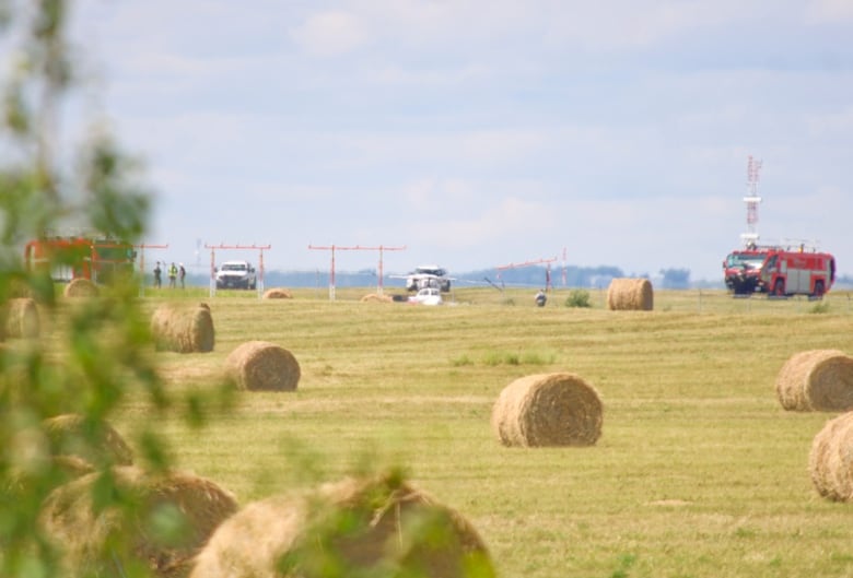 A Snowbird aircraft down in a field