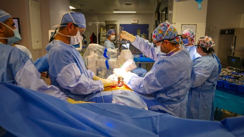 Doctors in an operating room.