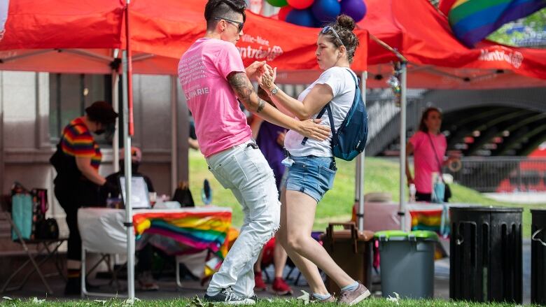 Two people are dancing