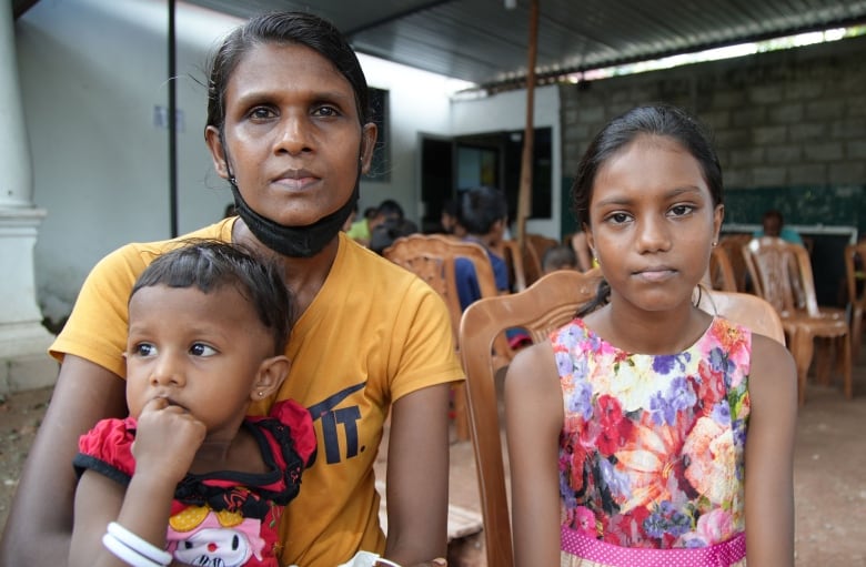 Sri Lankan woman with her two young daughters.