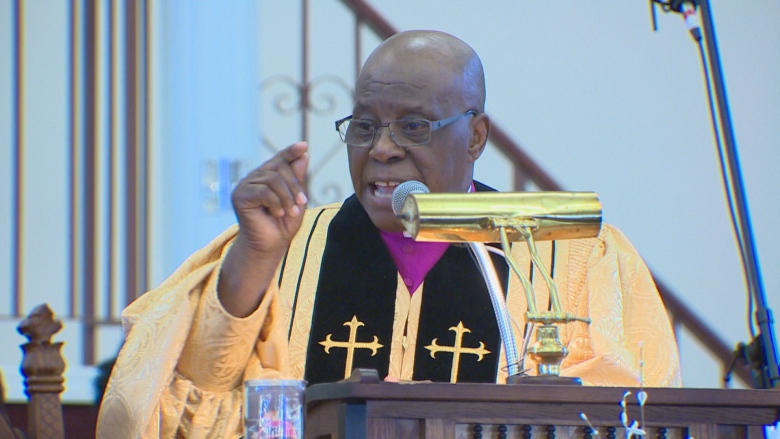 Rev. Wallace Smith Sr. preaches to his congregation.