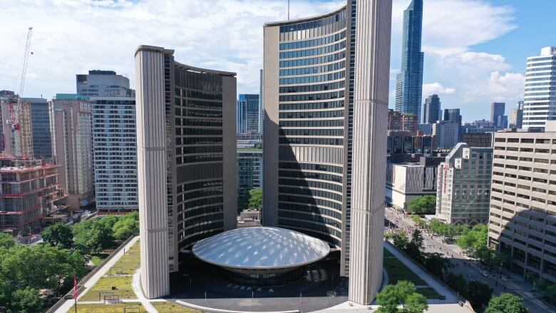 A drone shot of Toronto's city hall. 